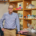 Dr. Ben Van Mooy standing in his lab, surrounded by equipment.